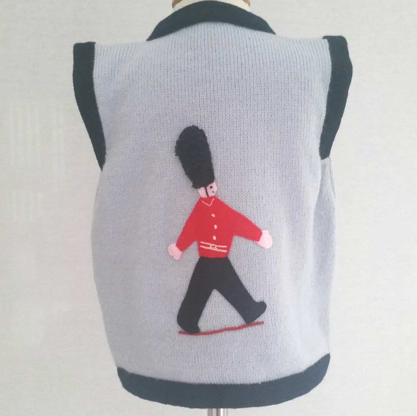 Boy's Soldier tank top in pale blue with marching guardsmen embroidered on by hand.