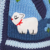 A Traditional Peruvian design - boy's country jumper in denim blue with animals on.