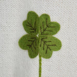 Girl's Cardigan off-white with clover and ladybirds embroidered all over.