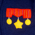 Boy's Admiral Jumper in navy blue with a hood and zip front.